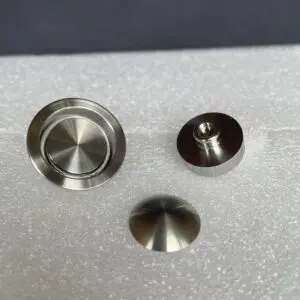 A close up of some metal parts on a white surface